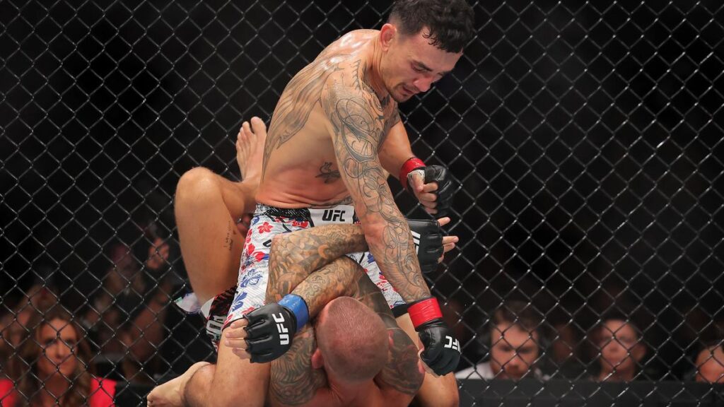 UFC 318: Holloway beats Poirier to retain BMF title