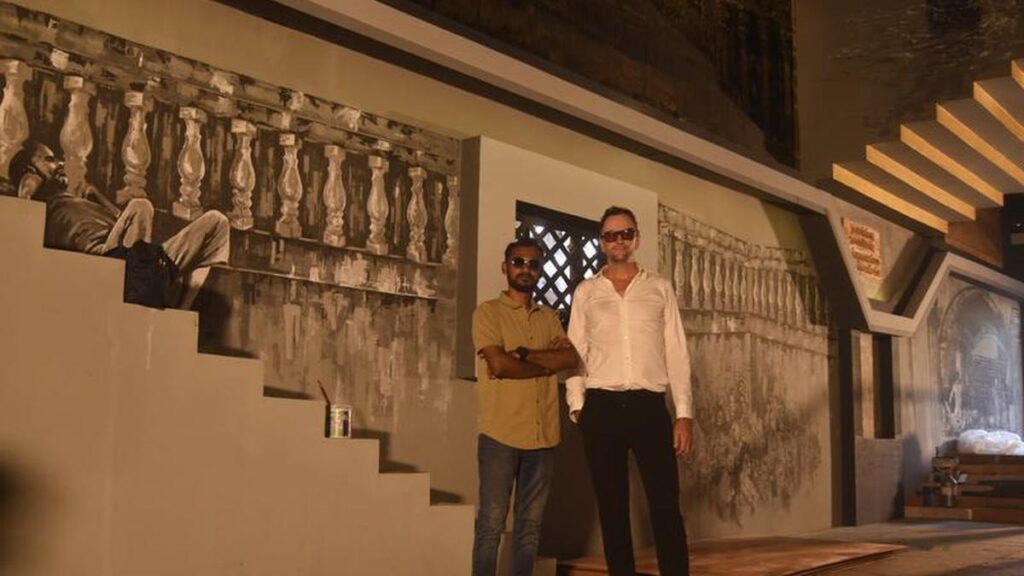 A golden tribute: French-Bengali art collaboration brings Kolkata’s ghats to life at Durga Puja pandal